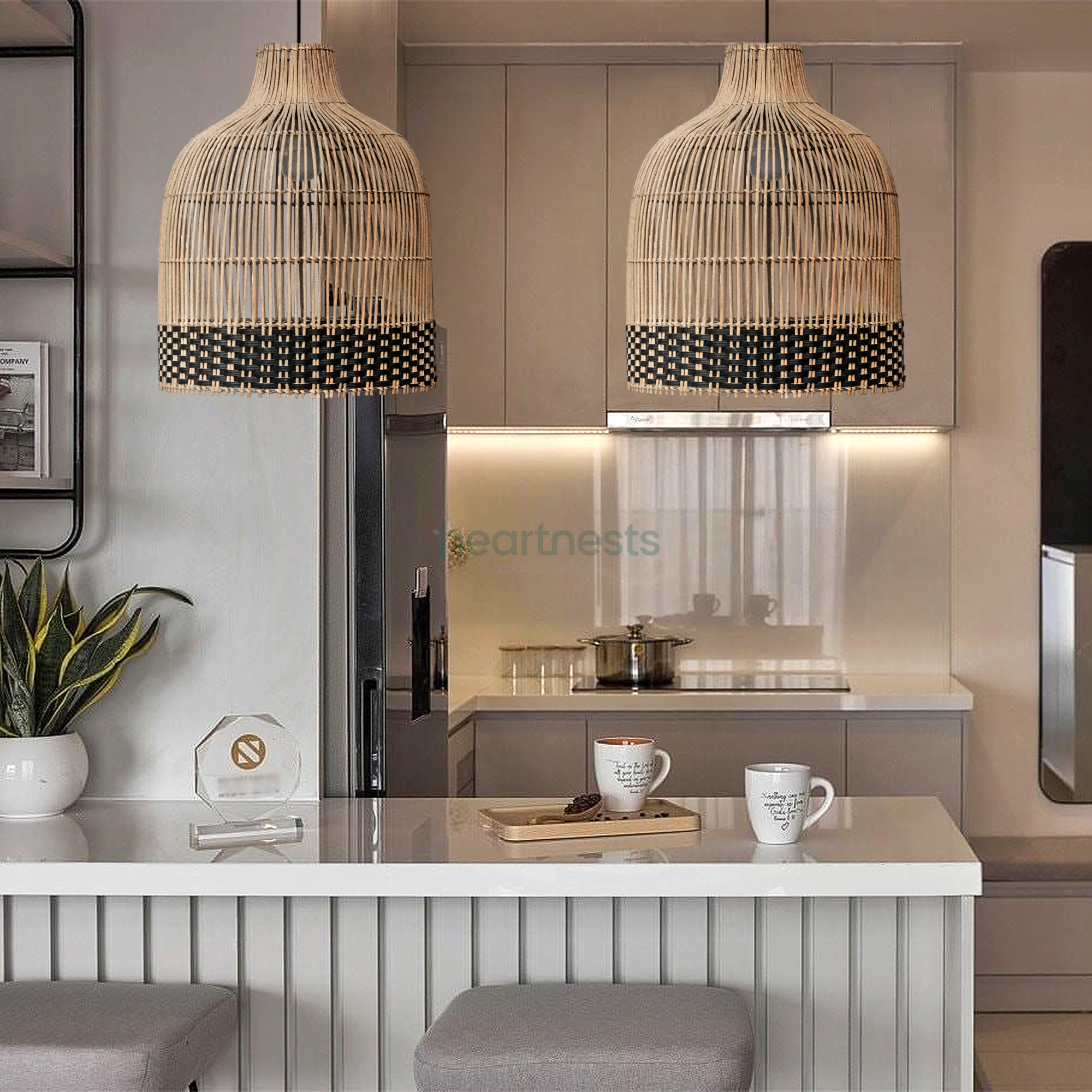 Heartnests's 2 Ayla rattan hanging light are hung side by side above a wooden top, white colour kitchen island inspired modern decor style