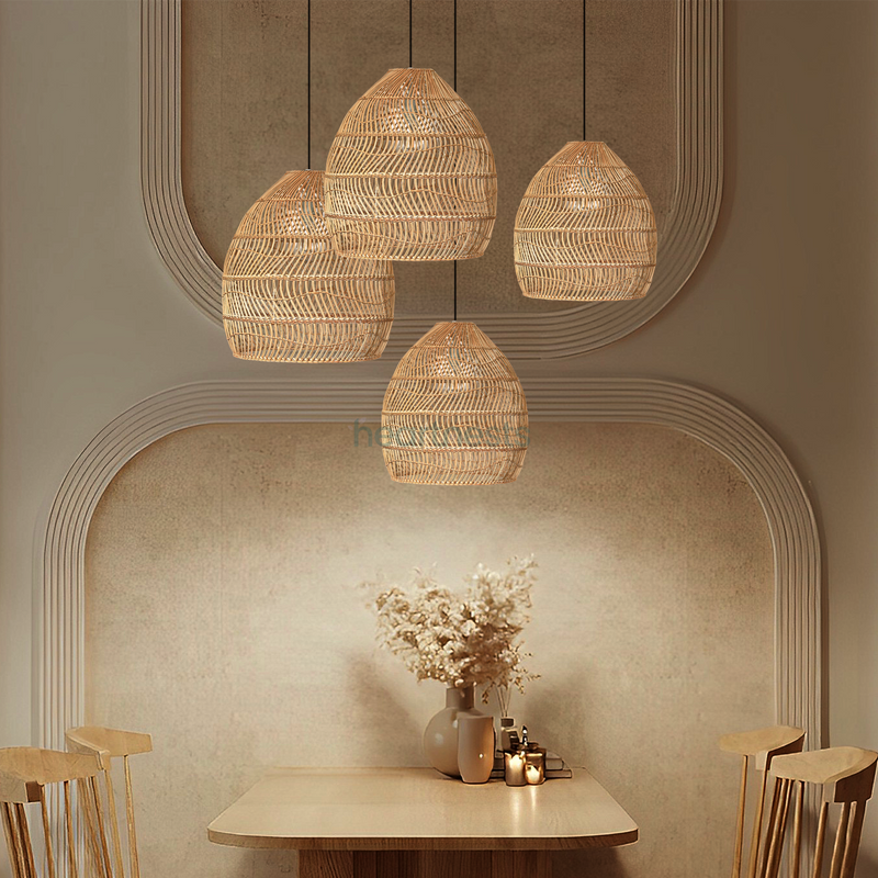 In a kitchen or living room following modern boho design concept, a cluster of 4 of Heart Nests' Acacia rattan pendant light is hung over a wooden table with an autumn vibe flower pot and 4 wooden chairs