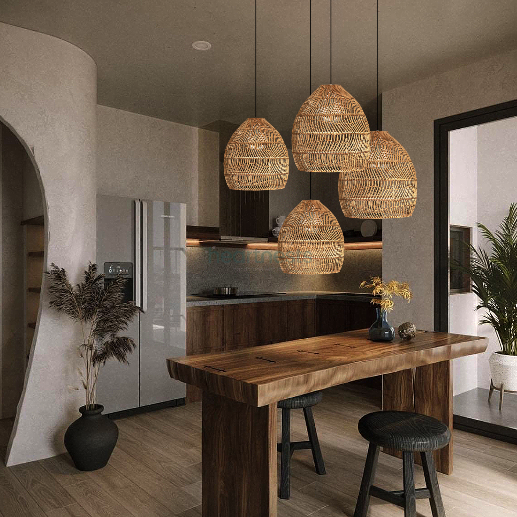 4 of Heart Nests's Acacia Rattan Pendant Light are hung in a cluster over a rustic wooden kitchen island in a modern kitchen area with a pot plant and a refrigerator