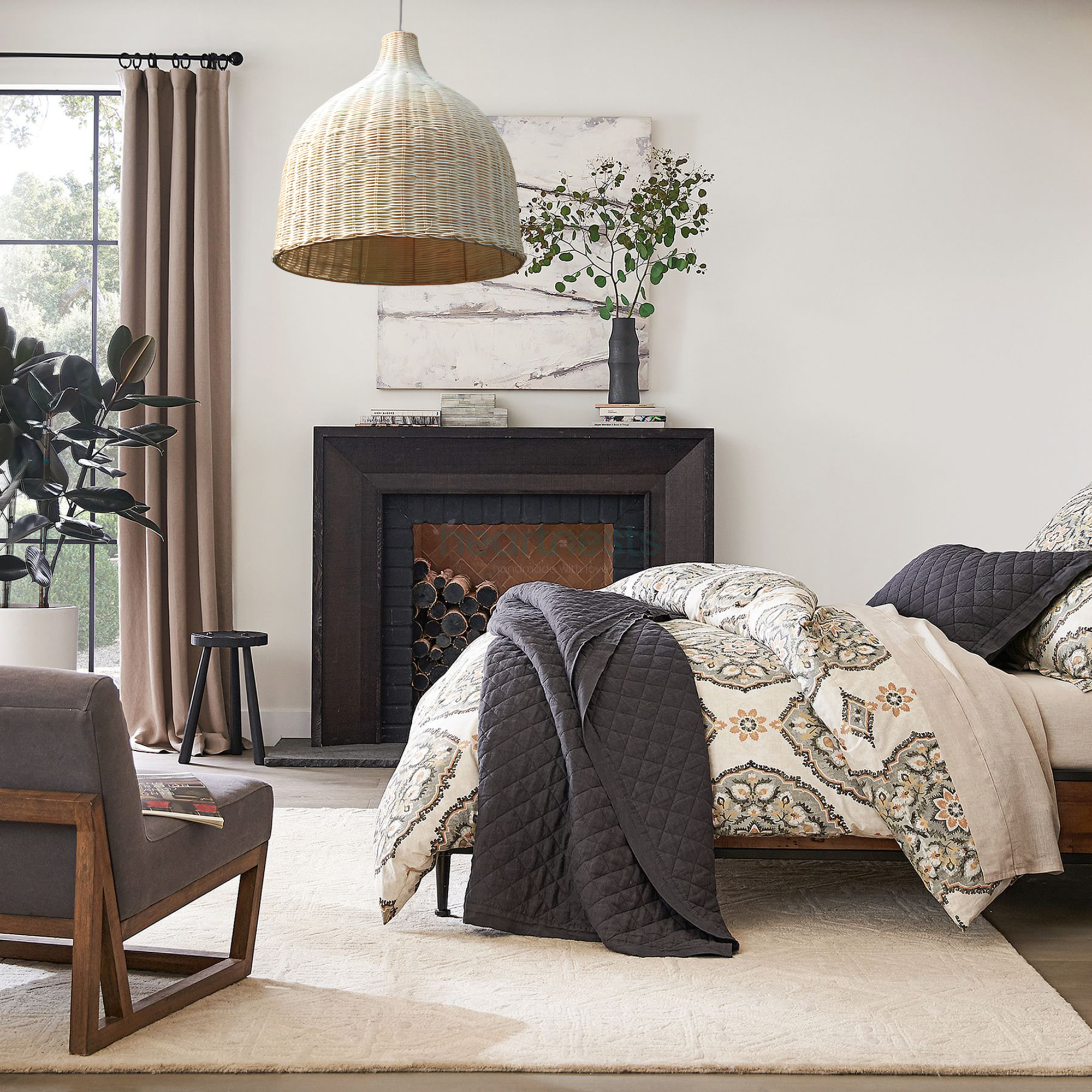 1 of Heart Nests's Baleria Rattan hanging light is hung over a bed with black throw, inspired modern farmhouse decor