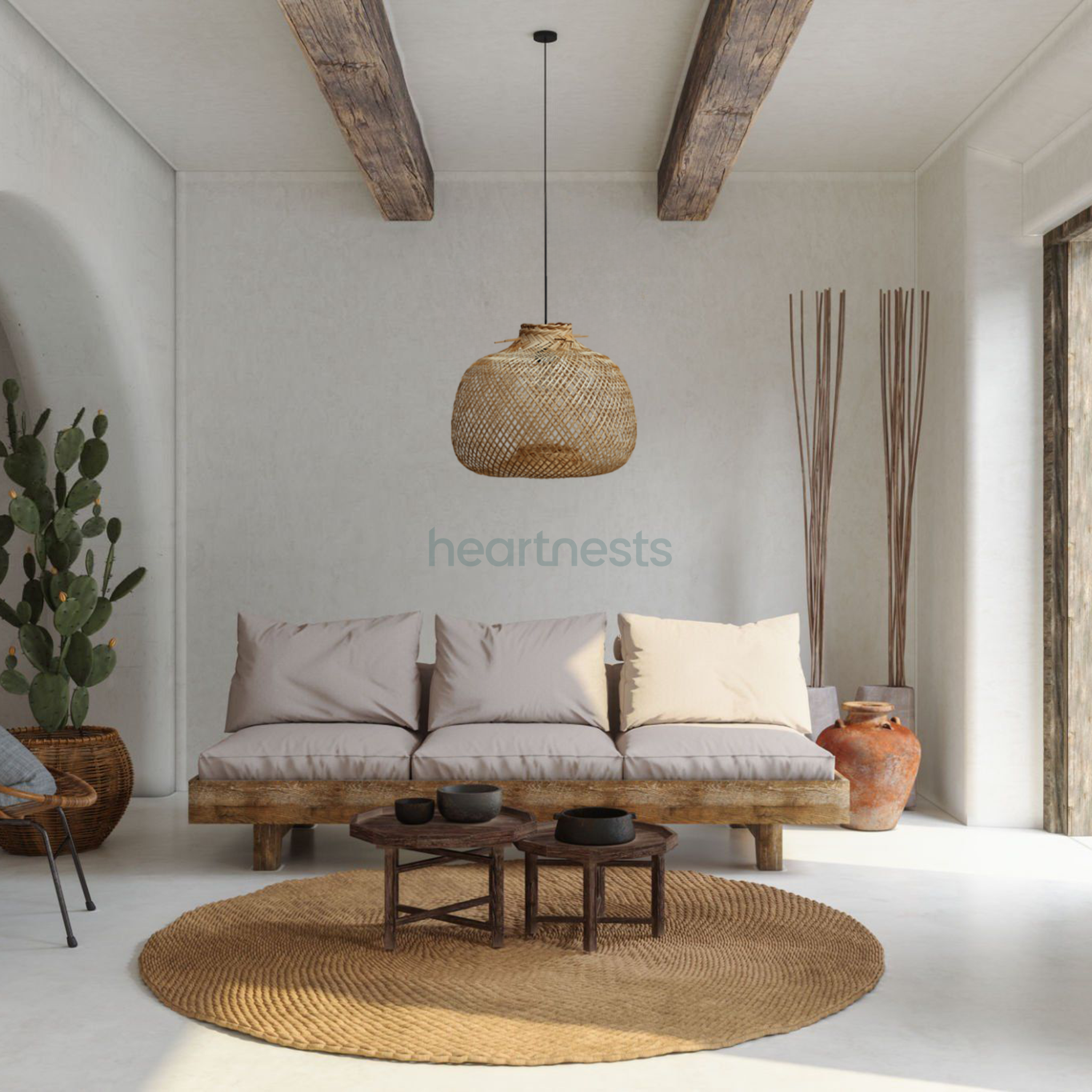 A Bali bamboo hanging light is hung above a set of 3 seater sofa and a wooden table in a farmhouse style living room