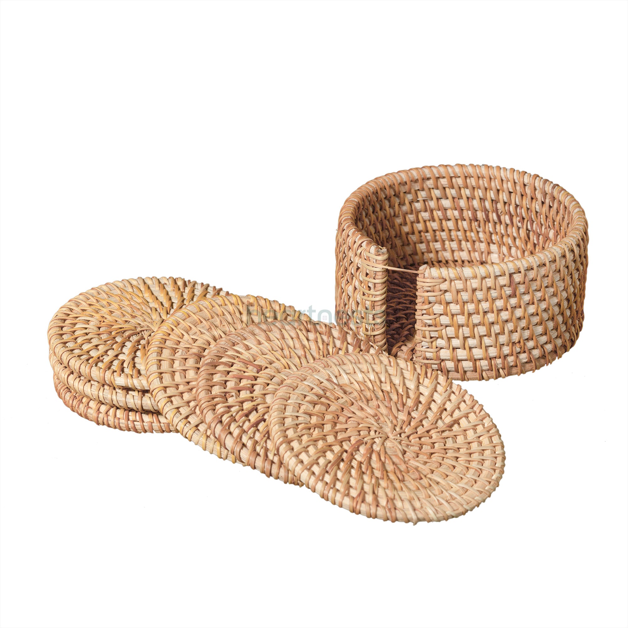 A close up view of Heartnests's Costella Rattan Coasters and coaster holder