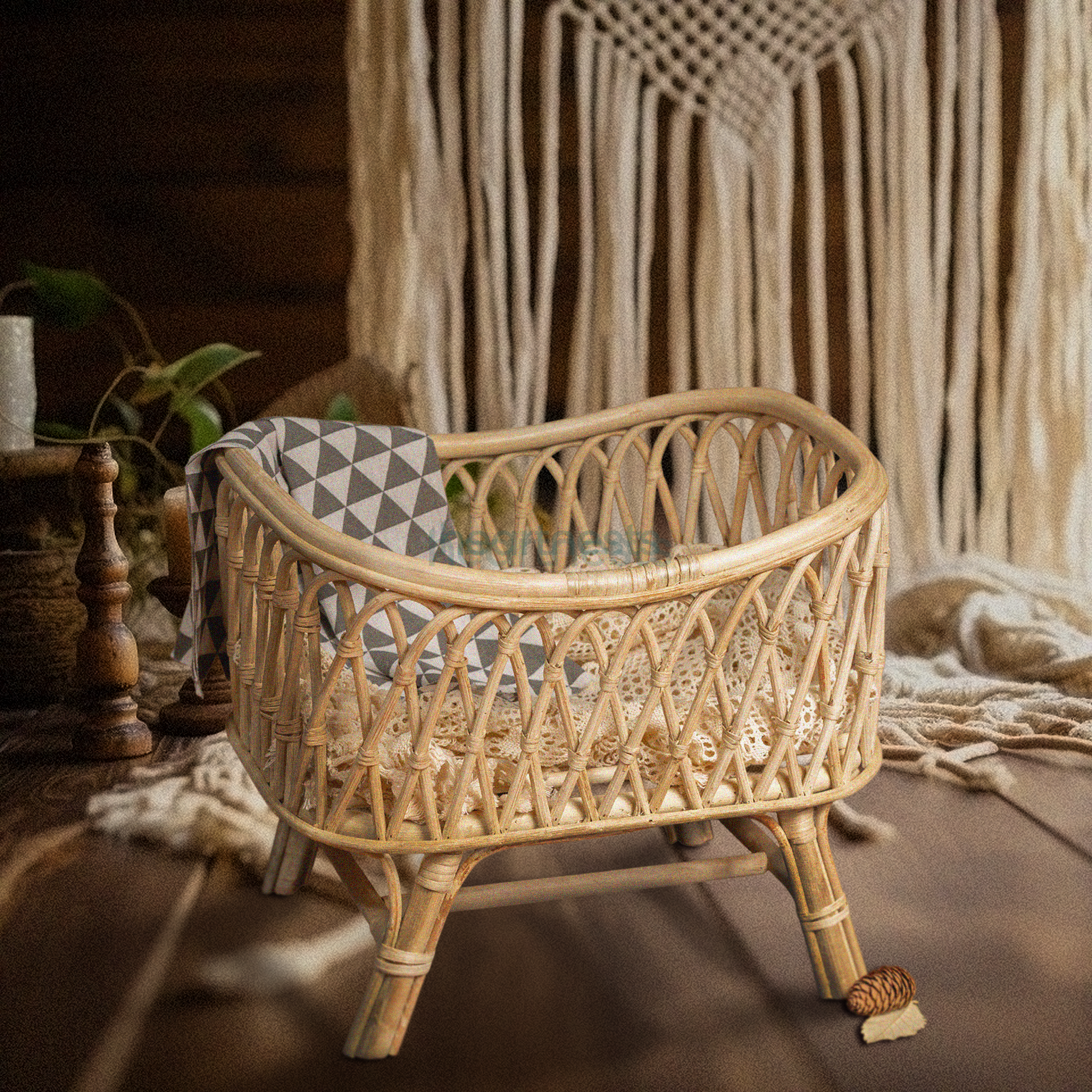 Heartnests's Cra Newborn Prop on a wooden floor and its background is a white macrame