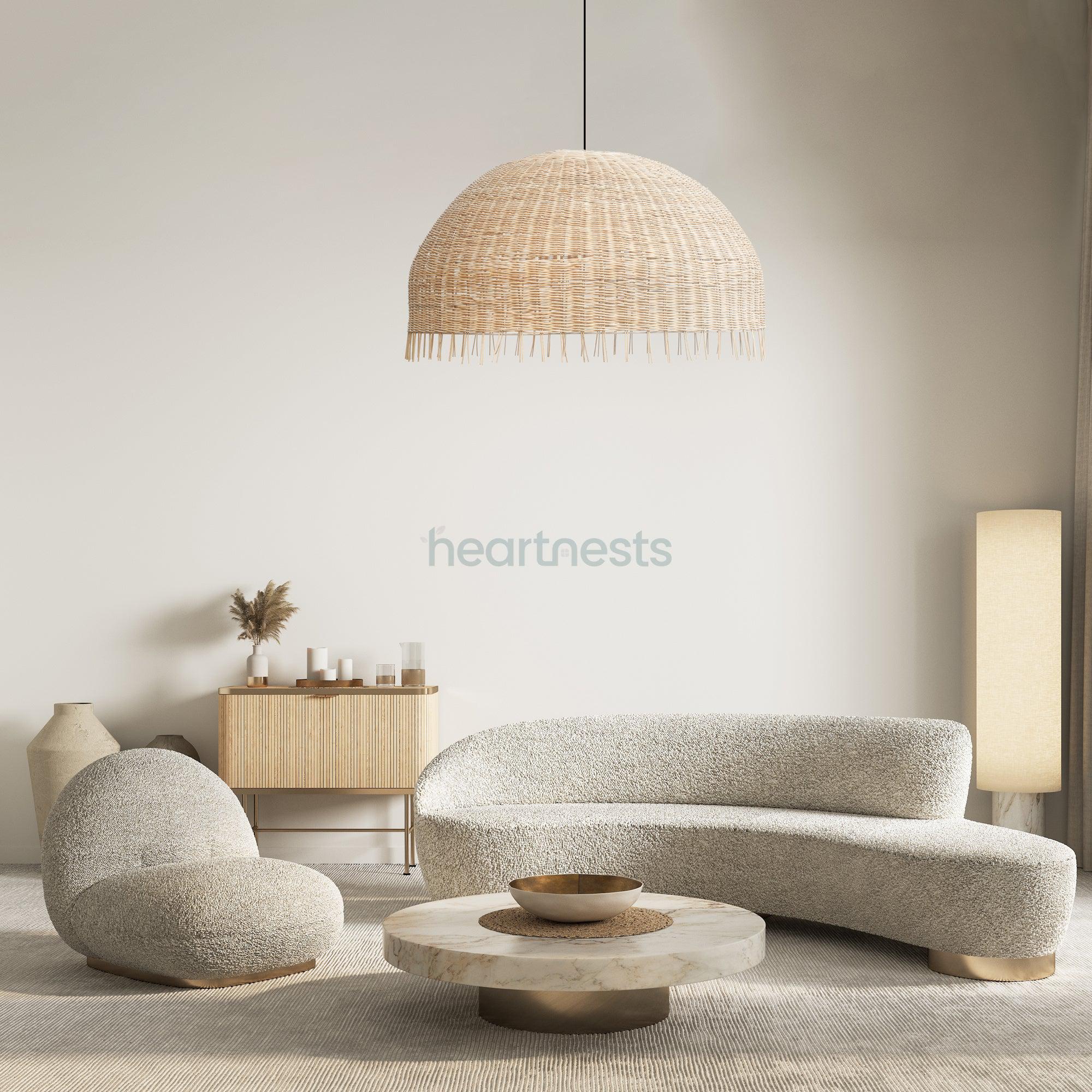 A Heartnests's Daria Wicker Hanging Light is hung above a boucle lounge in a contemporary living room decor setting
