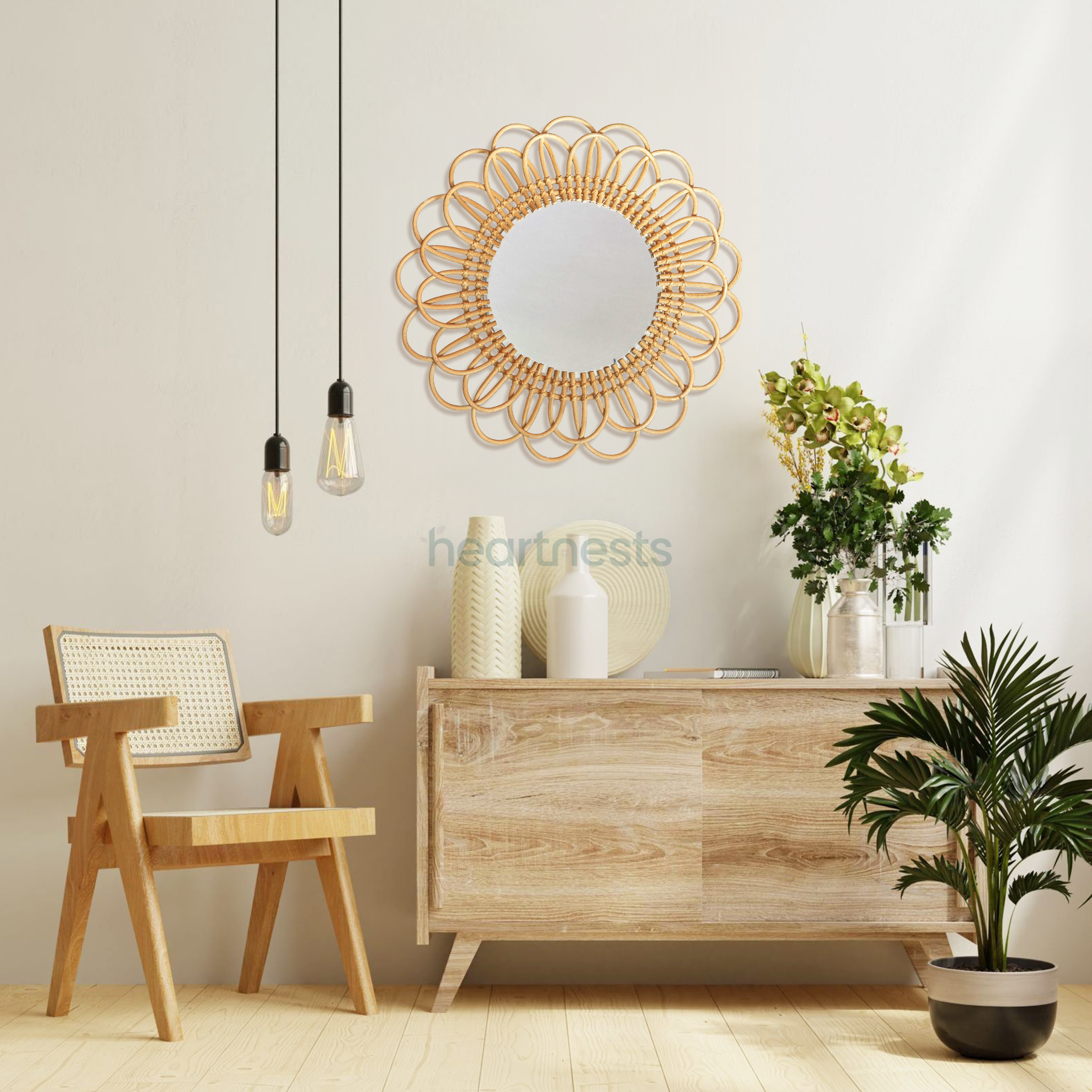 A Heartnests' Flora Rattan Mirror is hung on a beige color wall above a neutral color wooden hallway table and a pot plant following minimal interior design