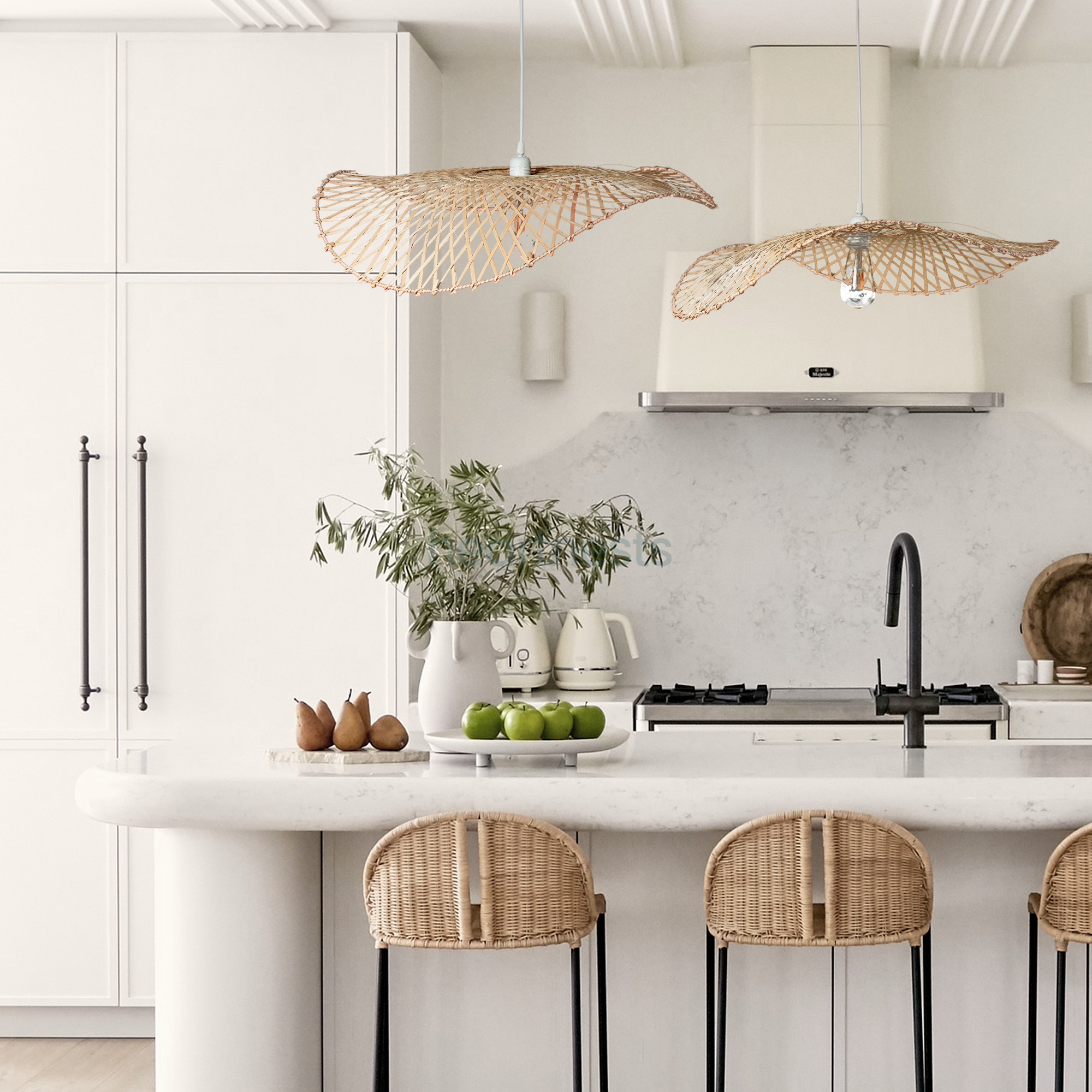 2 of Heartnests' Hakea Rattan Hanging Lights are hung above a white marble top kitchen island and 2 wooden kitchen stools