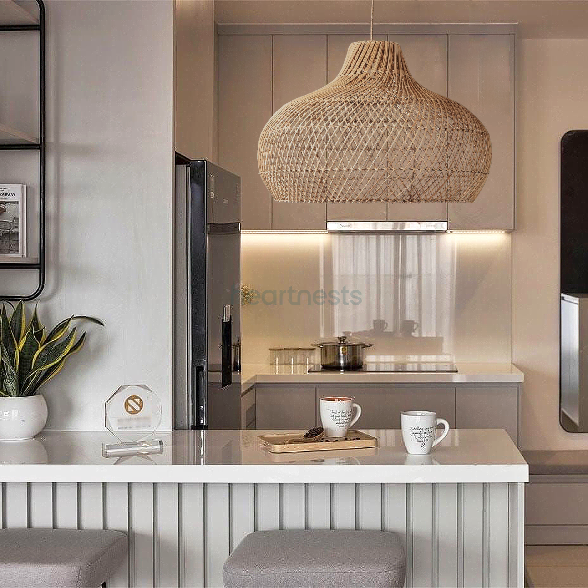 A Hearnests's Fraser Wicker Pendant Light is hung above a kitchen island and 2 kitchen wooden stools in a contemporary decor style kitchen