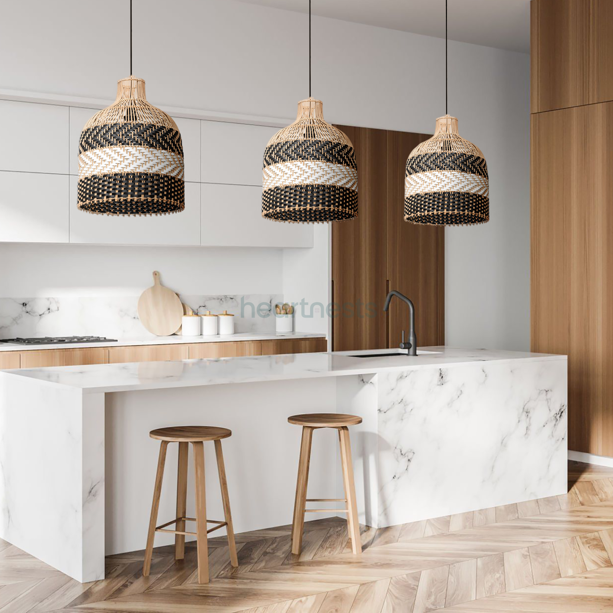 3 of Heartnests' Luka Wicker Pendant Lights are hung side by side over a white marble top kitchen island in a contemporary style kitchen