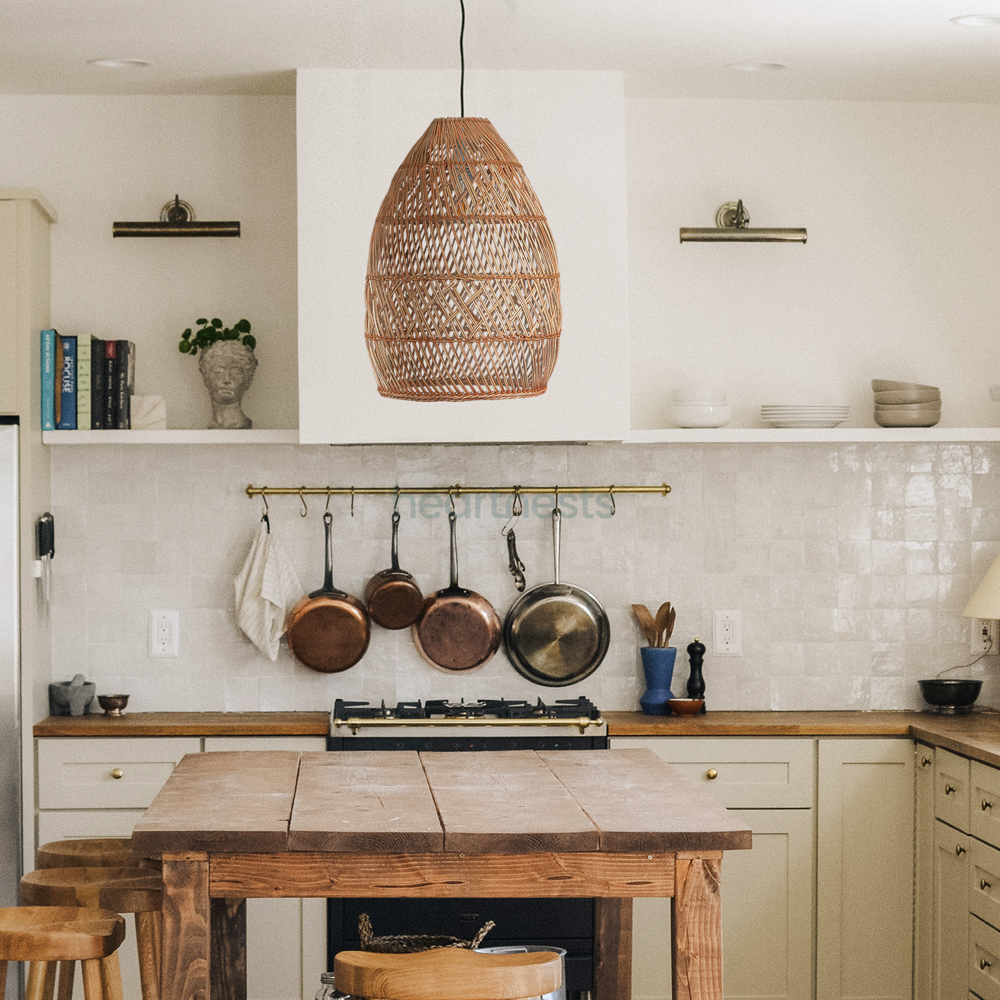 A Brighton Rattan Pendant Light is hung above a kitchen island in a rustic kitchen setting