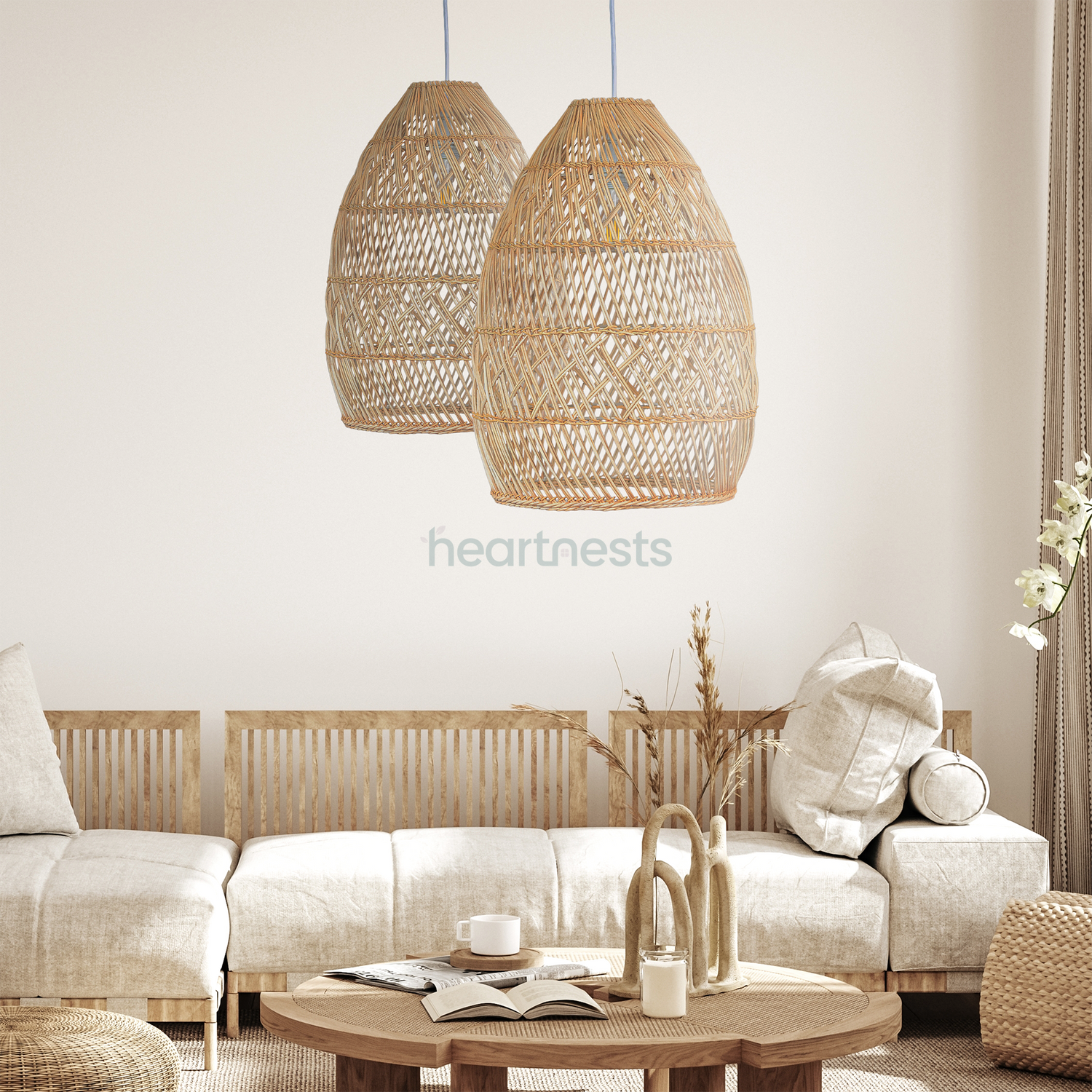 2 Brighton Rattan Pendant Light are hung above a circular wooden living room table and a rattan lounge in a boho living room decor setting