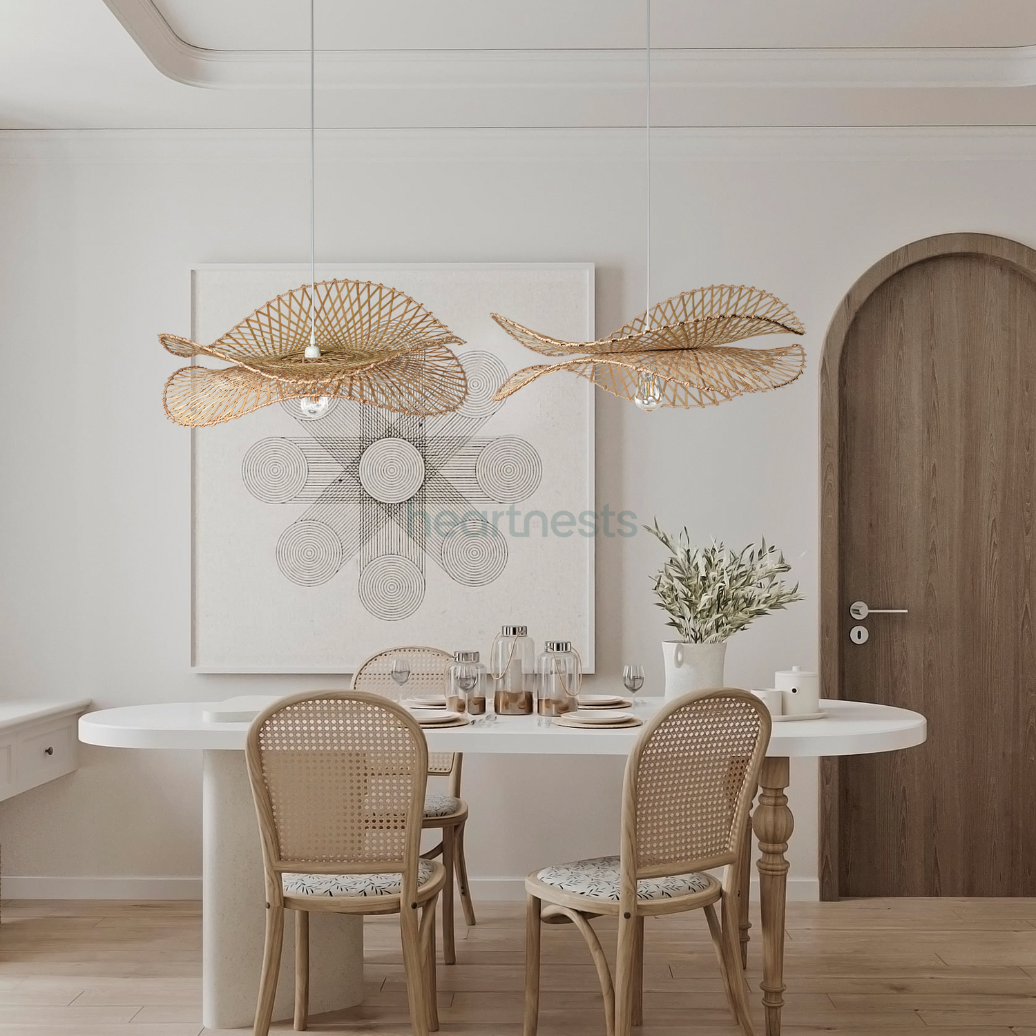 2 of Heartnests's Correa Wicker Pendant Lights are hung above a soft edge white dining table and 2 rattan dining chairs