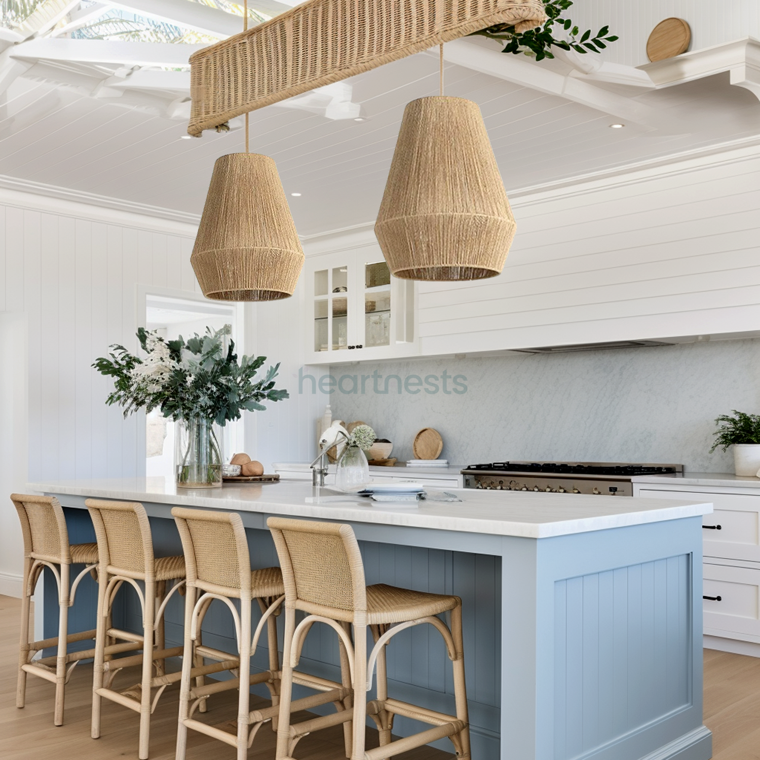 2 of Heartnests's Long Diamond Jute Hanging Light are hung above a blue kitchen island with white marble top and 4 rattan kitchen stools in a coastal kitchen decor setting