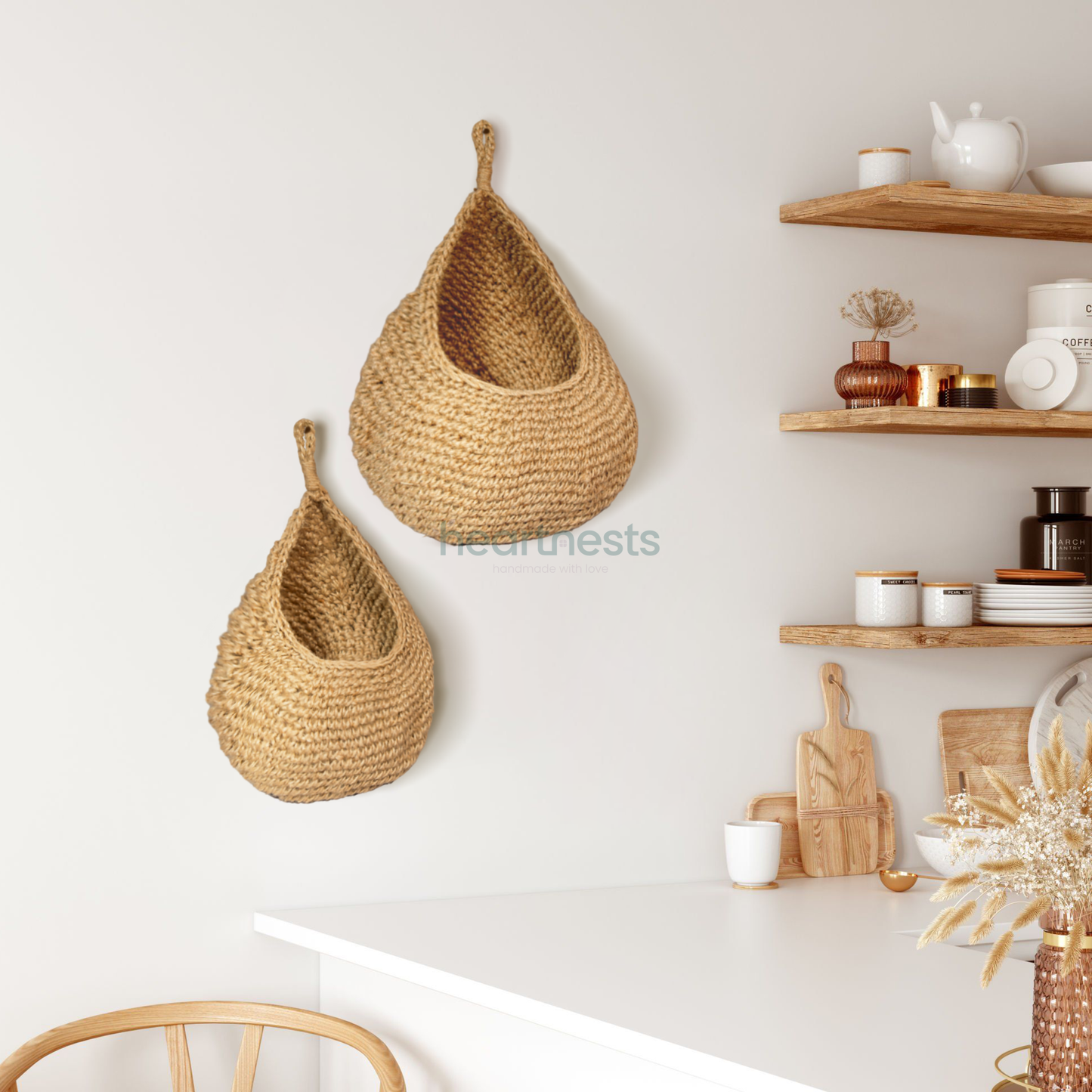 2 of Heartnests' Onia Seagrass Wall Storage are hung on a beige colour wall at different heights  next to wall wooden storage shelves