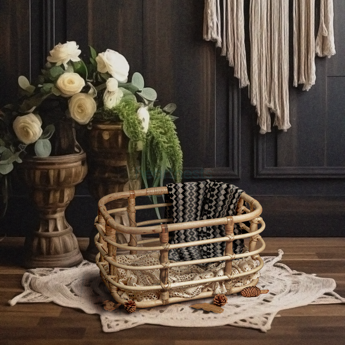 Heartnests' Peony Rattan Baby Photography is on a star shape white macrame on a wooden flooring next to white flower vase, against a dark tone wooden wall