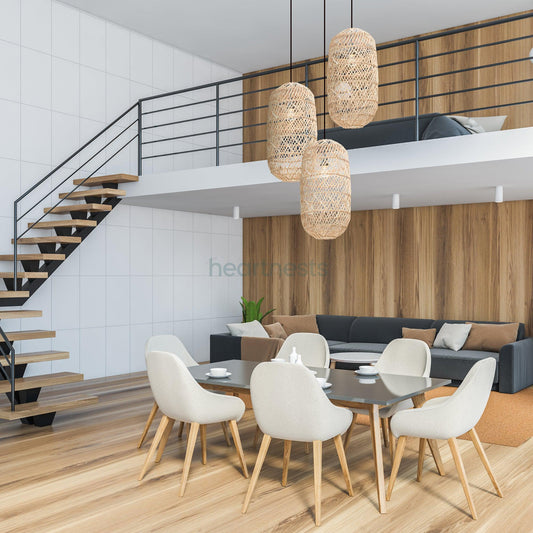 3 of Heartnests' Moreton Rattan Pendant Lights are hung in a cluster above a contemporary light grey colour dining table and chair set in contemporary decor style living room